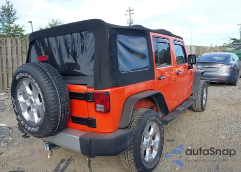 2015 Jeep Wrangler Unlimited Sahara from USA, damaged, VIN 1C4HJWEG6FL584288